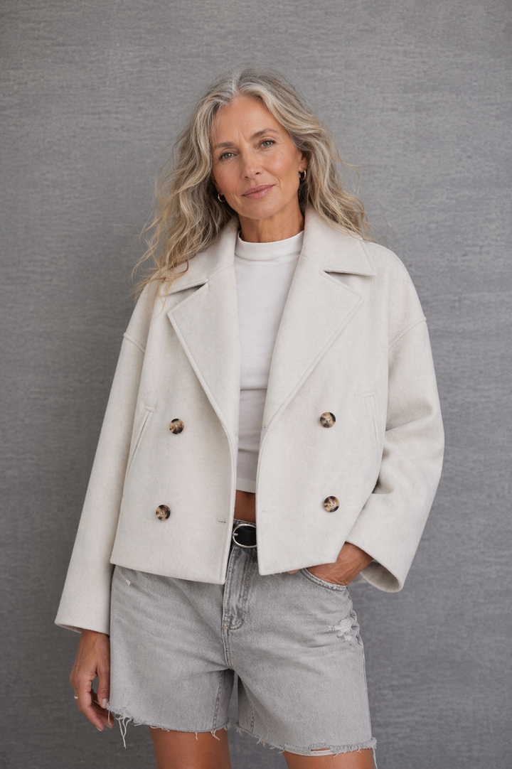 Veste chic courte à double boutonnage pour femme