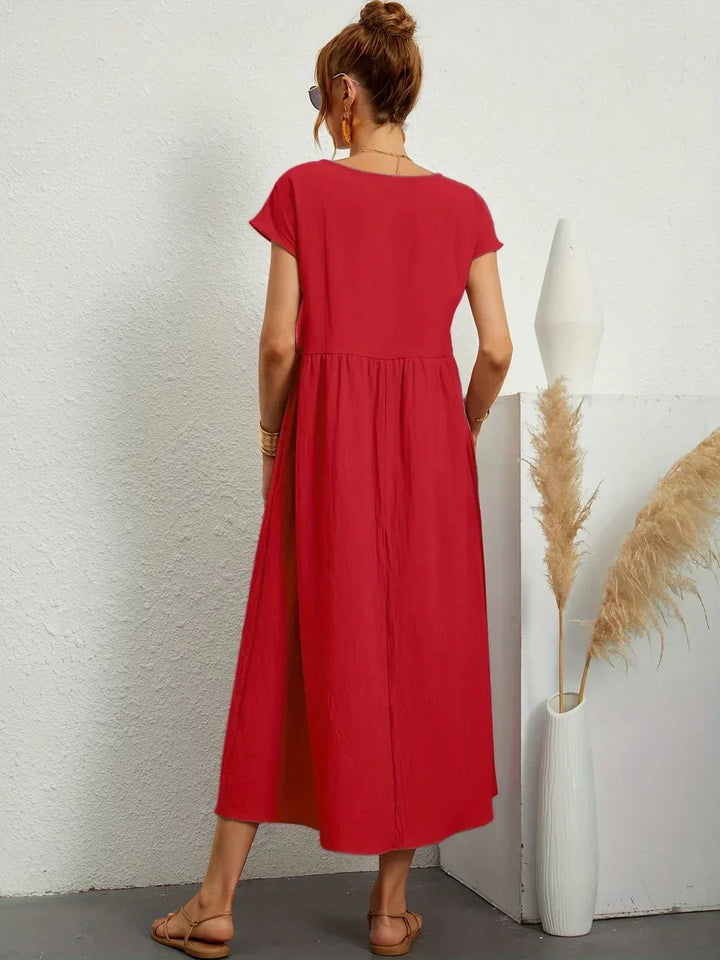 Robe midi fluide élégance intemporelle