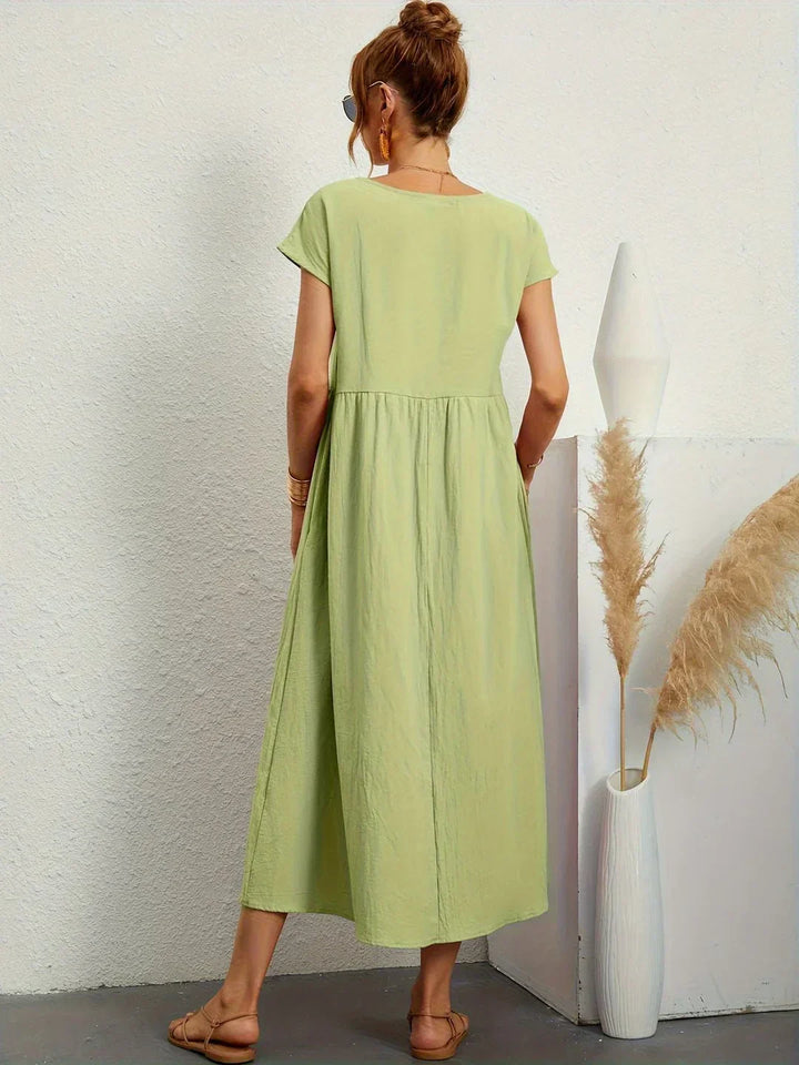 Robe midi fluide élégance intemporelle